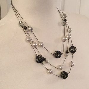 3 string Pearls and beaded necklace